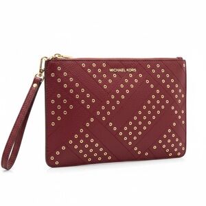 Michael Kors Burgundy XL Pebbled Leather Wristlet with Studded Design.